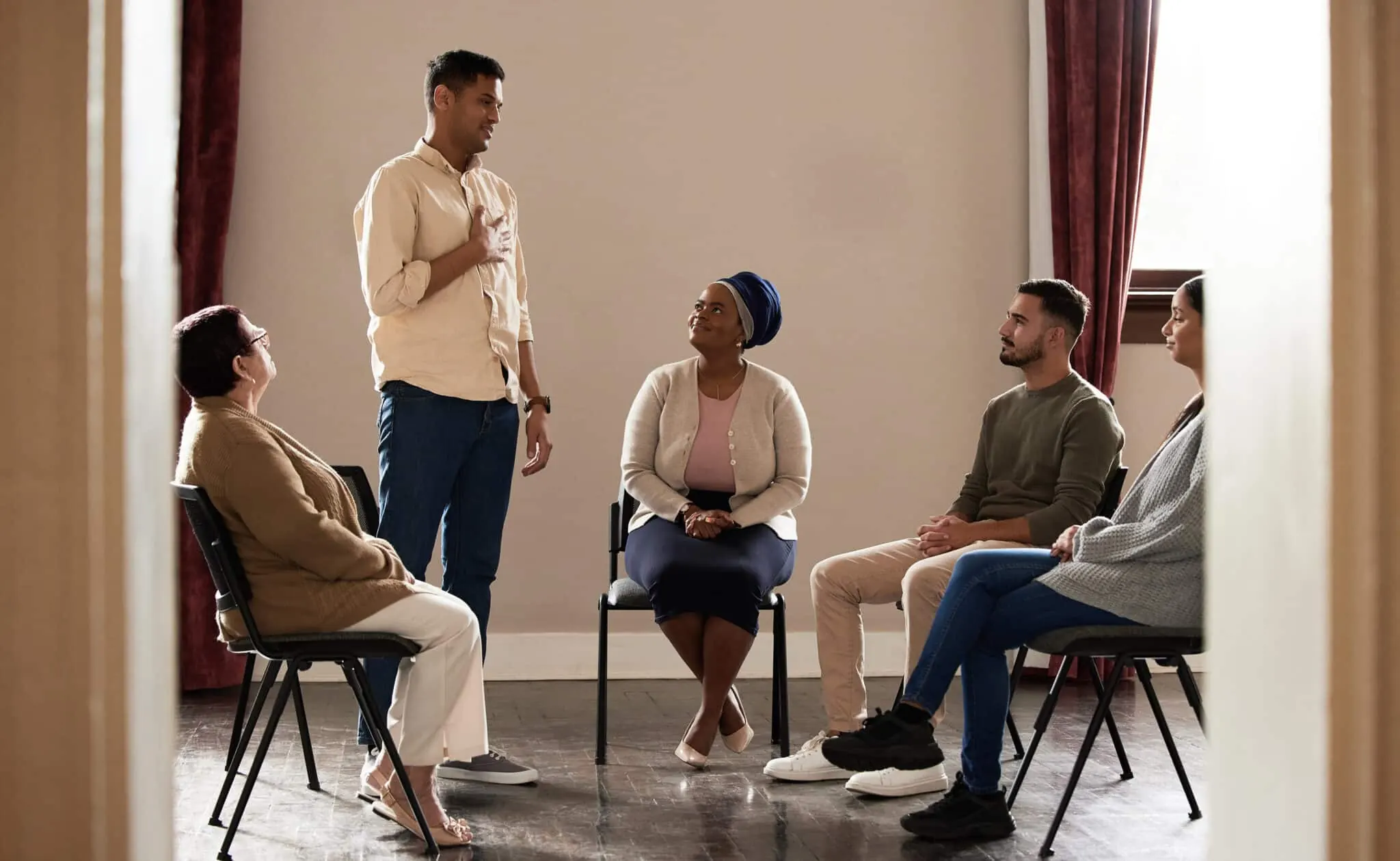 Group therapy session at addiction treatment center
